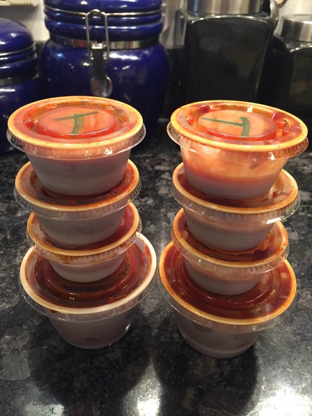 little cups of BBQ sauce