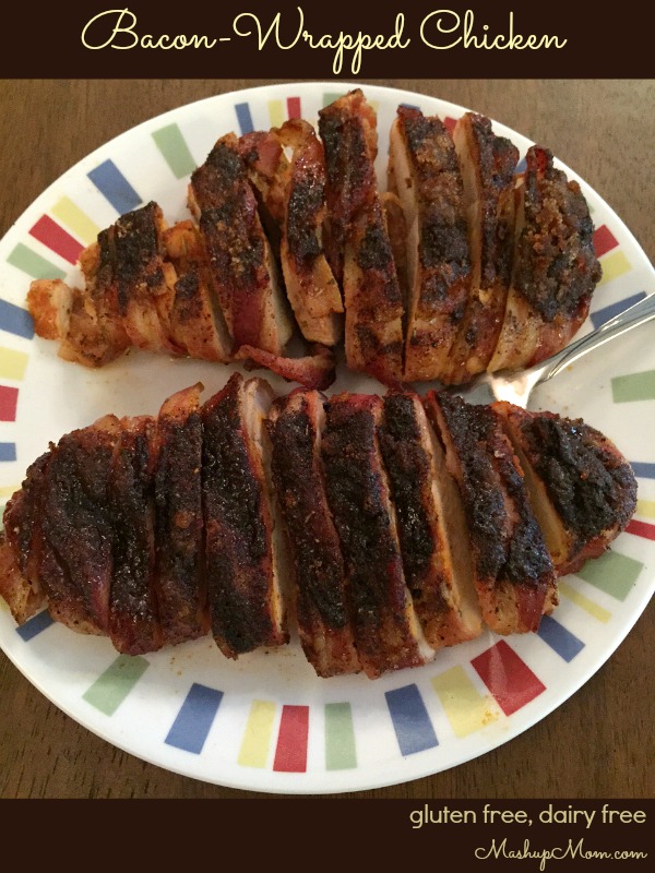 Bacon-wrapped chicken, sliced on a plate