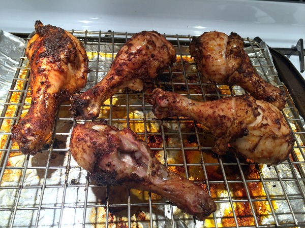 baked drumsticks on rack