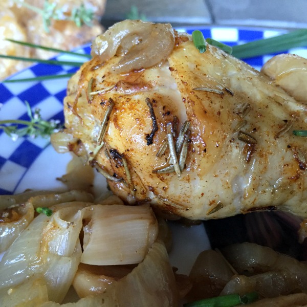 Close up of a garlic chicken drumstick
