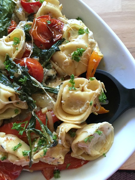 Roasted Vegetable Tortellini Bake -- A cheesy & delicious baked tortellini Meatless Monday Meal! Full of cheese and roasted veggies for a filling & flavorful vegetarian dinner idea.