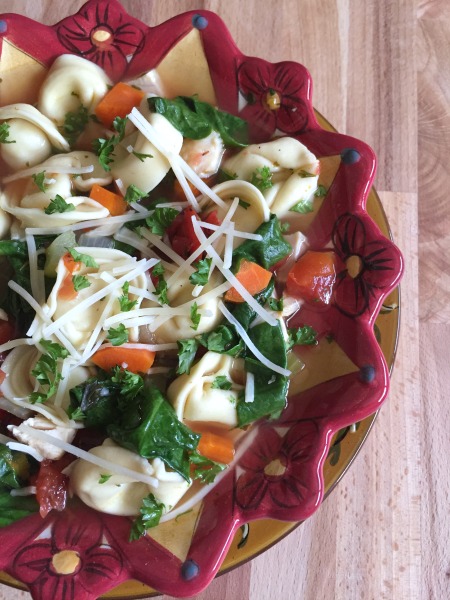 bowl of chicken spinach tortellini soup