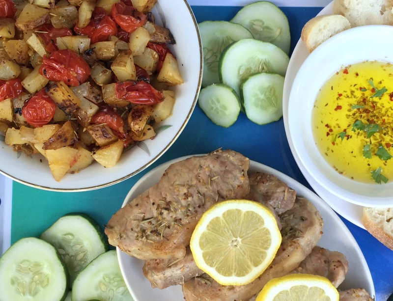 lemony pork chops, potatoes, and tomatoes