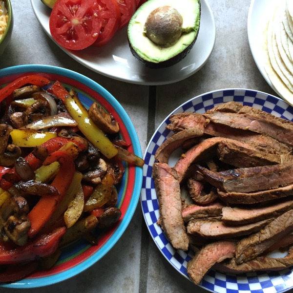 Easy steak fajitas with onions, pepper, and mushrooms -- Gluten free (use GF tortillas) and low carb (use a low carb wrap)!