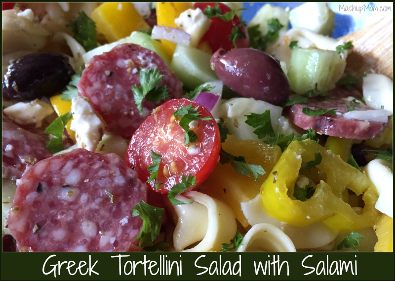 bowl of tortellini salad with salami and veggies