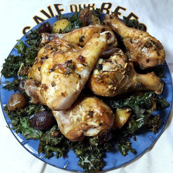 Sheet Pan Chili-Lime Chicken Drumsticks with Baby Potatoes and Crispy Kale -- A flavorful one pan meal! Naturally gluten free.