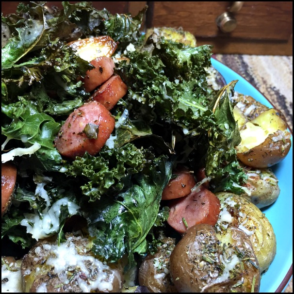 Crash Hot Potatoes with Smoked Sausage & Crispy Kale, a sheet pan dinner recipe.