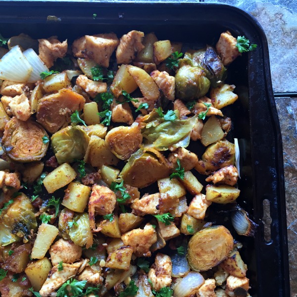 roasted veggies and chicken on a pan