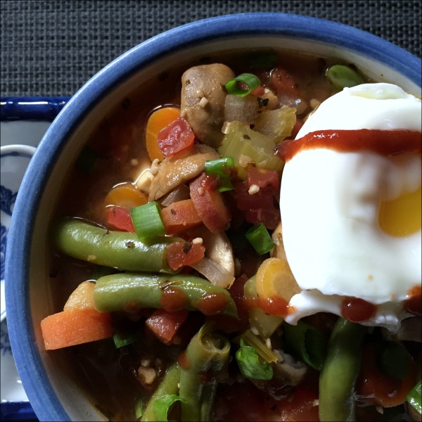 Kicked up rainbow vegetable soup is not ramen by any stretch of the imagination, but it's spicy, savory, and good -- and it hit the spot with just enough of that spicy-savory ramen-type flavor I was craving. Try it for a different twist on your usual vegetable soup recipe.