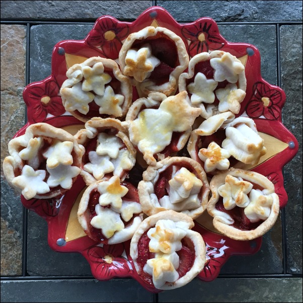 plate of strawberry tarts