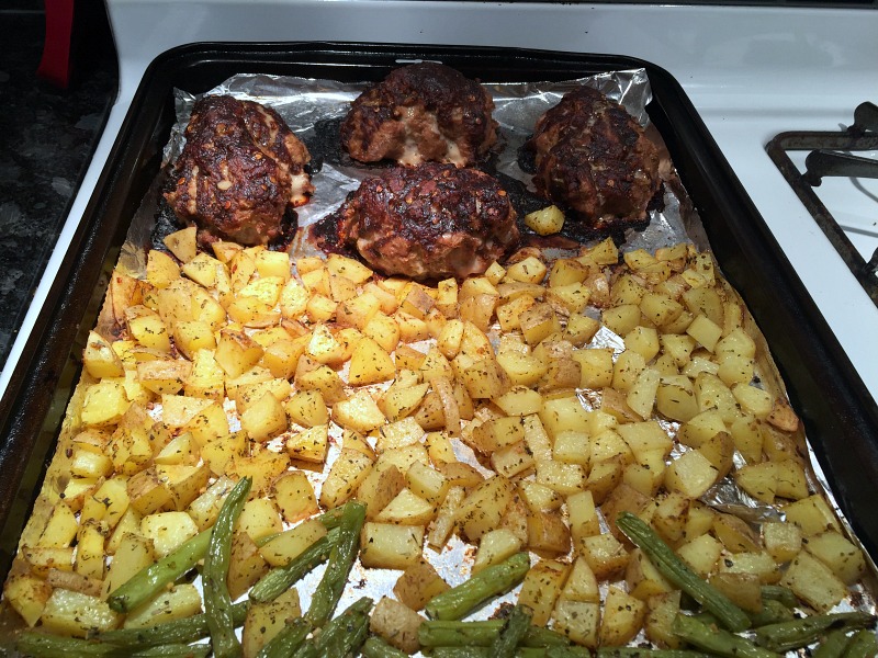 meatloaf and potatoes on a pan