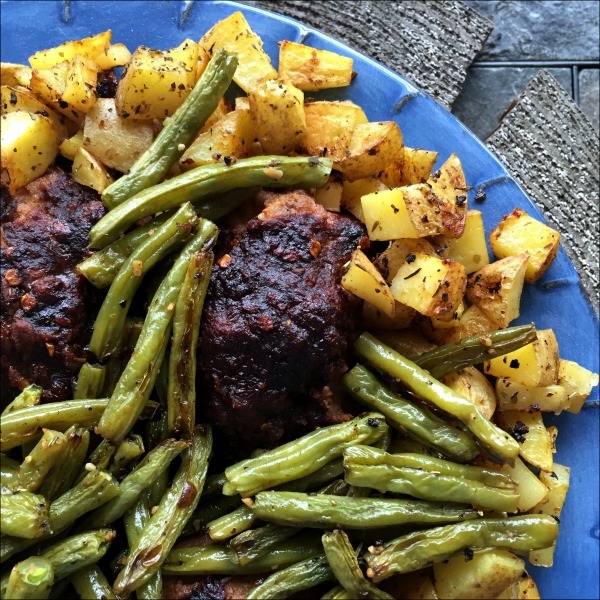 plate of meatloaf potatoes and green beans