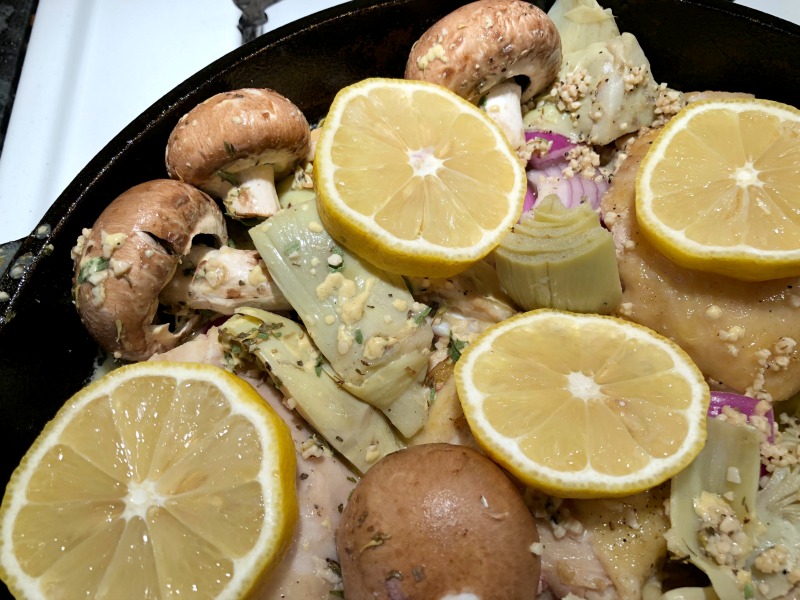 This lemon chicken skillet with artichokes and mushrooms is darn tasty, if I do say so myself! Just tangy enough and garlicky good, while the sauce also helps keep the thighs nice and juicy. Lemon Chicken Skillet Madness is naturally low carb and gluten free.
