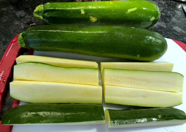 Cut zucchini -- This flavorful 30 minute pork chops and zucchini recipe creates its own built-in side, making it an affordable weeknight dinner option for four. (The Greek yogurt sauce here really brings out the flavor in both the zucchini and the chops!) Broiled pork chops and zucchini are naturally low carb and gluten free.