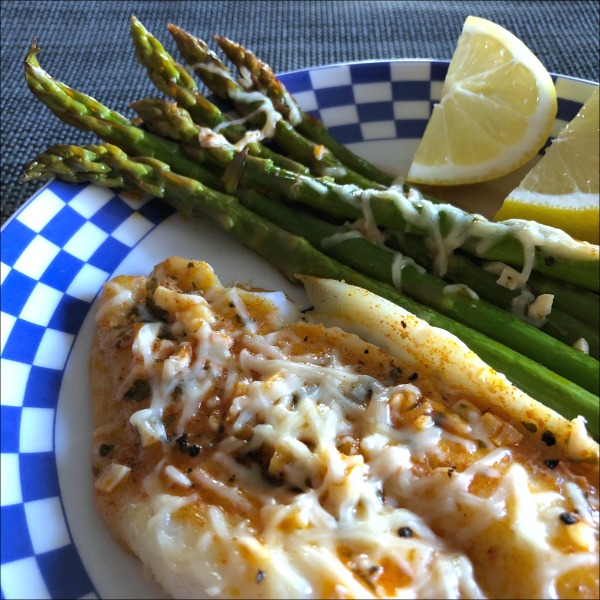 Looking for a 30-minute weeknight fish recipe? These Easy and naturally low carb + gluten free Flounder & Asparagus Packets give you both a protein and a veggie in one simple dish; just bulk up this simple baked fish recipe by adding cooked rice (or riced cauliflower) plus some fruit on the side in order to fill out a complete meal.