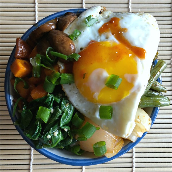 Filling rice, hearty mushrooms, and protein-packed egg make these Meatless Monday Gochujang Veggie Bowls a meatless meal that even confirmed carnivores can get behind. This vegetarian dinner recipe pairs crisp-tender green beans and onion with chewy mushrooms, soft spinach, & sweet potatoes; while a little salty soy sauce and rich sesame oil work together to kick up the sweet-smoky-spicy flavor of the Gochujang.