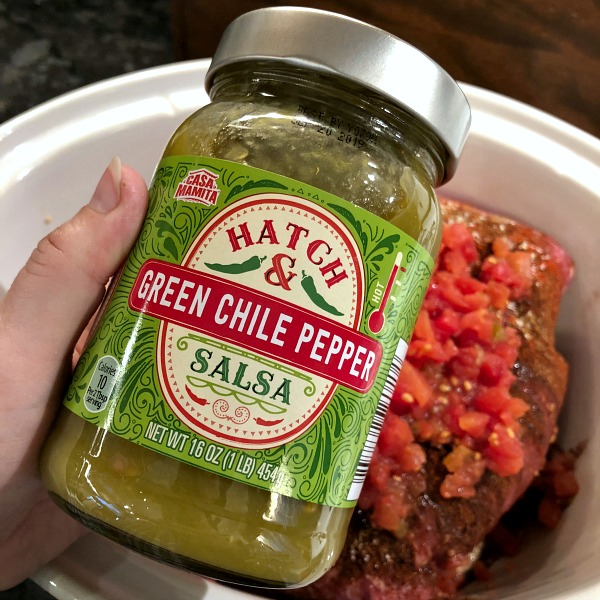 This savory Slow Cooker Salsa Verde Pulled Pork recipe (made here with ALDI's Hatch + Green Chile Pepper Salsa!) sports so much flavor for such a simple Crock-Pot meal, and leaves you you with plenty of leftover pulled pork to re-purpose into any of a number of meals.