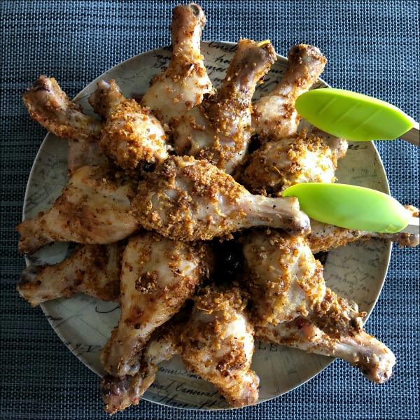 Tonight, why not shake up your normal chicken drumsticks recipe routine with these {title}? If you like garlic, you'll probably like this affordable and kid-friendly recipe for easy, cheesy, garlicky good chicken drumsticks!