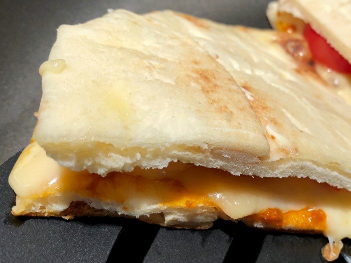 flipping naan grilled cheese