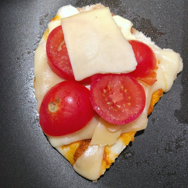 assembling naan grilled cheese