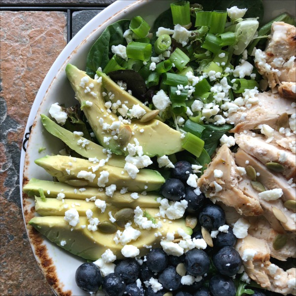 salad with avocado blueberries and chicken