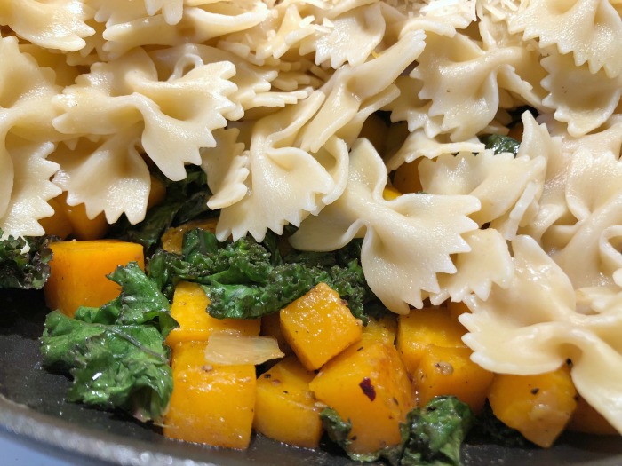 mix pasta into squash and kale