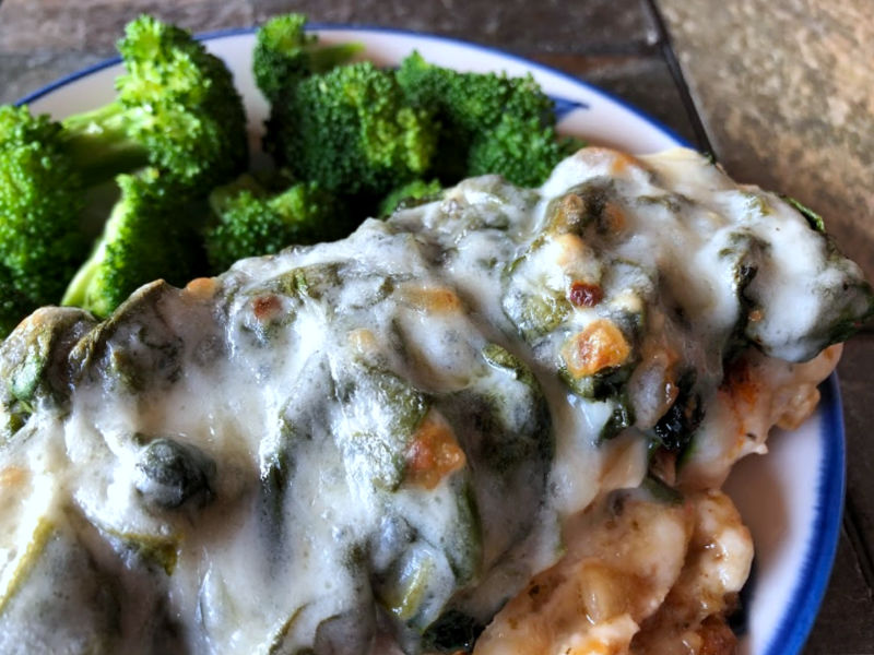 spinach cheese chicken on a plate