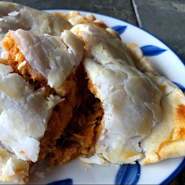 sweet potato hand pie with chicken, cut open