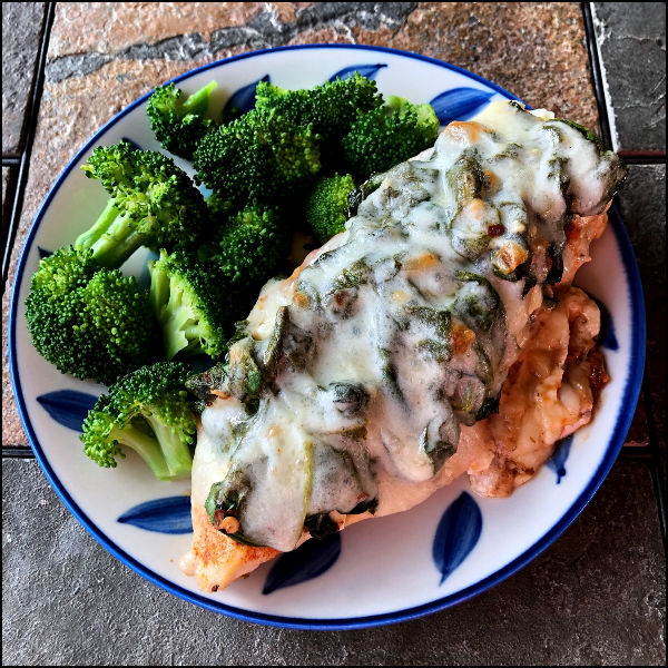 plate of cheesy chicken & spinach skillet, plus broccoli