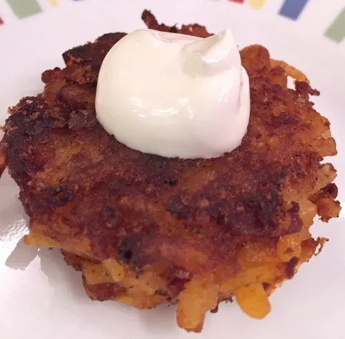 chipotle cheddar latke with sour cream