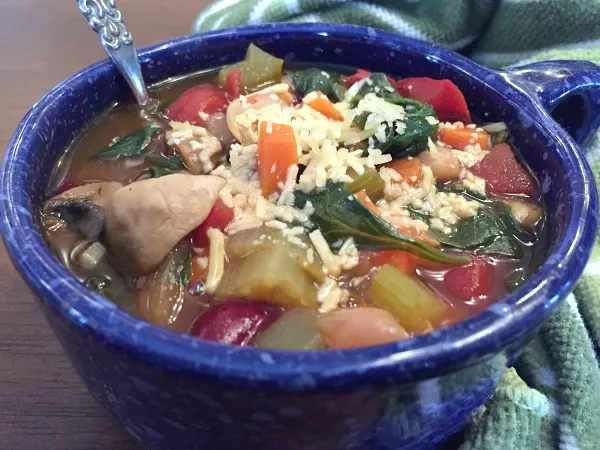 bowl of veggie soup with parmesan