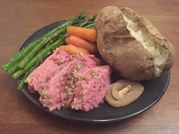 plate of corned beef carrots and veggies