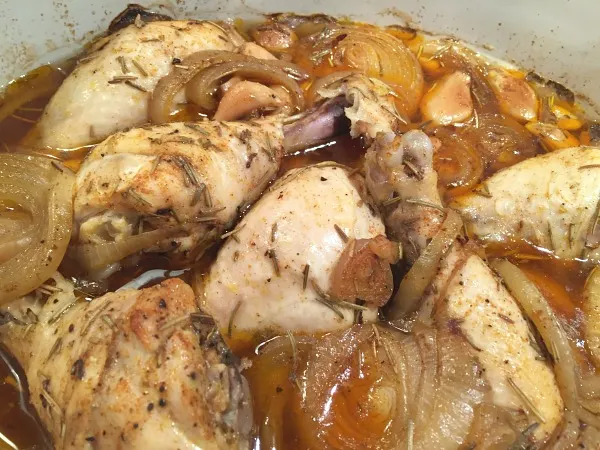 cooked chicken garlic and onions in the crock-pot