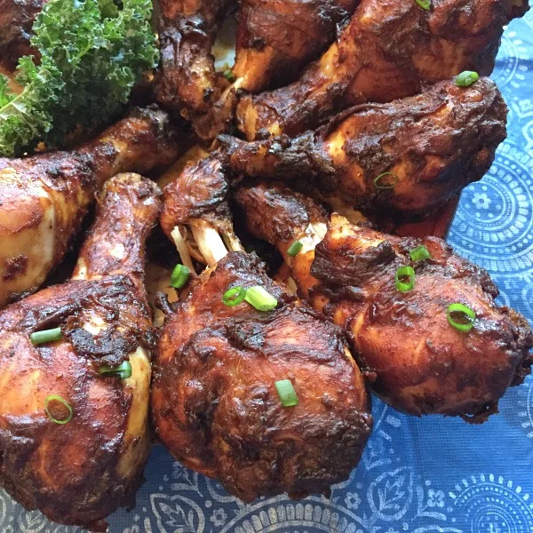 plate of BBQ chicken drumsticks