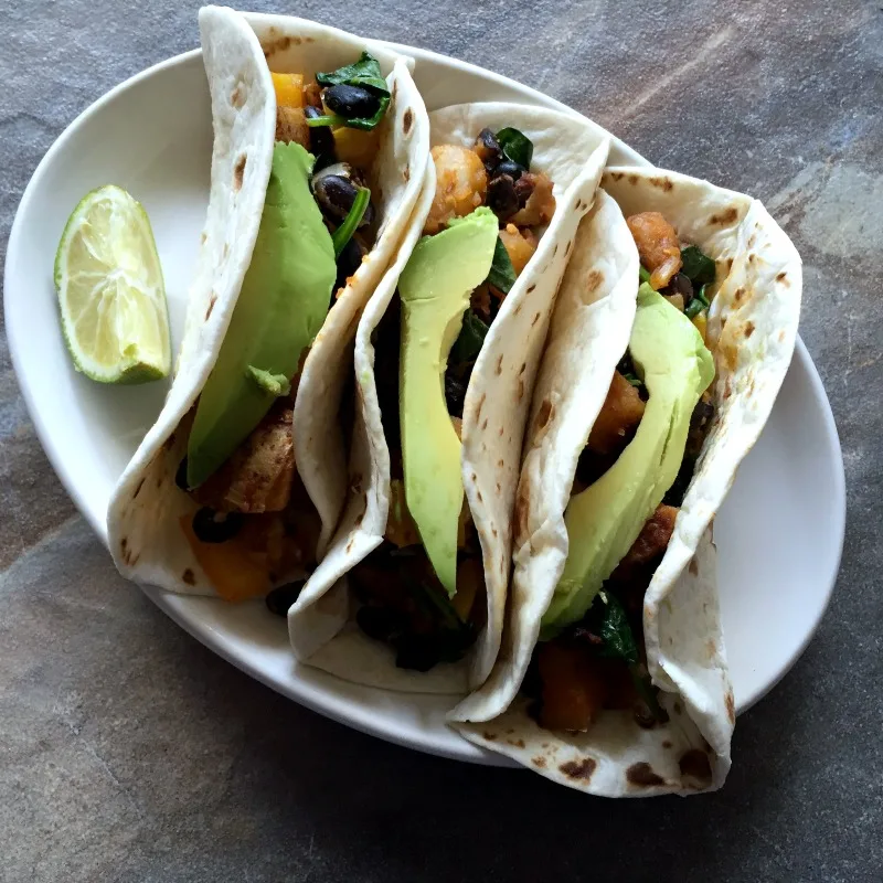 plate of black bean and potato tacos