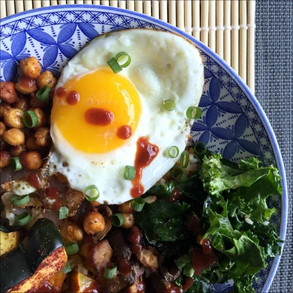 harvest vegetable rice bowls topped with a fried egg