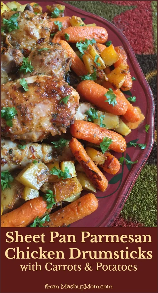 plate of parmesan drumsticks, potatoes, and carrots