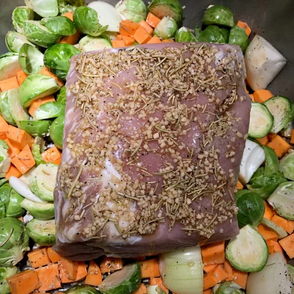 Parmesan Pork Roast with Brussels Sprouts & Sweet Potato has it all: In this gluten free one pan Sunday dinner recipe, the nicely browned sprouts get an additional shot of flavor from the salty Parmesan -- and contrast nicely with the sweet potatoes and juicy pork. 
