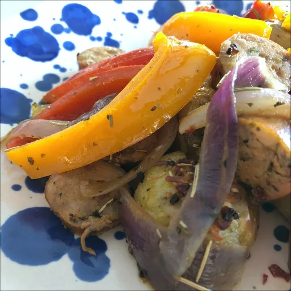 plate of potatoes with peppers and sausage