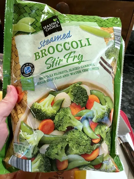 Frozen stir fry veggies: How about an easy 30 minute weeknight dinner recipe: Sweet & Tangy Chicken Vegetable Stir Fry! Red pepper jelly adds a sweet underlying tang to this easy 30 minute stir fry recipe, which complements both the salty soy and the slight kick from the red pepper flakes and ginger.