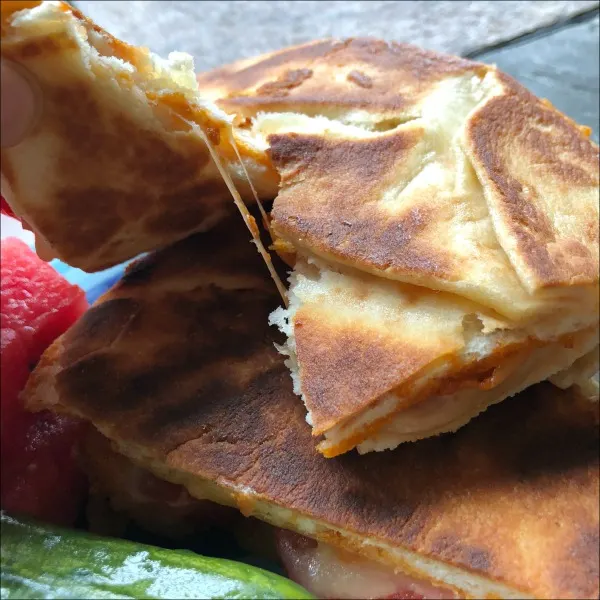 naan grilled cheese sandwiches recipe, with pesto and tomato