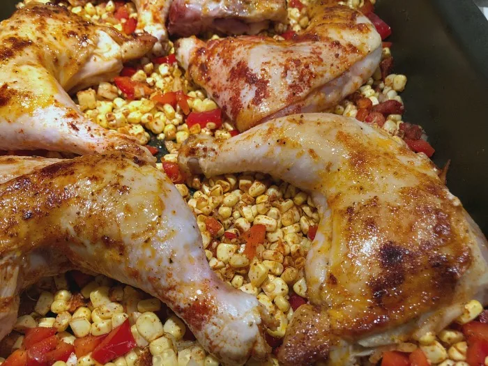 chicken and corn ready to go in the oven