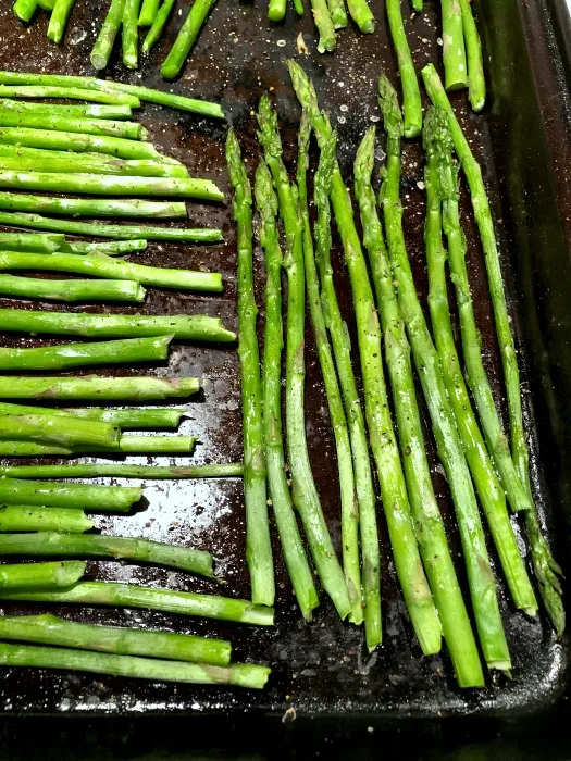 roasted asparagus on pan