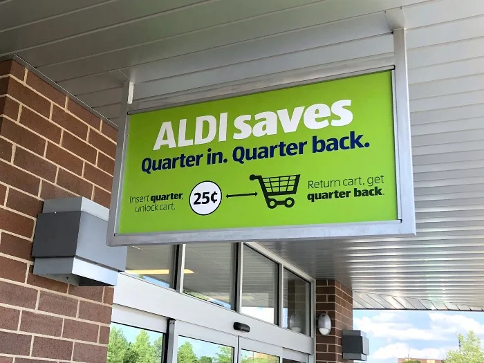 All I really need to know I learned in ALDI: With apologies to Robert Fulghum. This little unpretentious grocery store really represents its own microcosm of how to act and how to be in the world. ALDI teaches us everything from "Pay it Forward" to "Always Be Prepared." quarter in quarter back sign at aldi