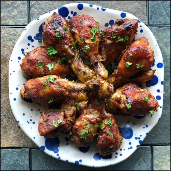 Plate of BBQ chicken drumsticks