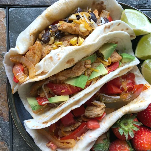 A plate of pork & pepper fajitas