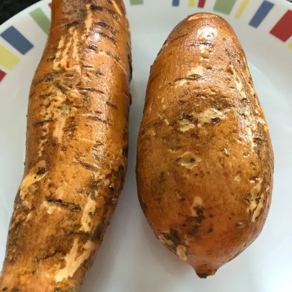 two sweet potatoes on a plate