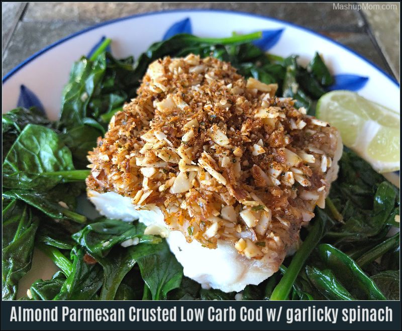 Almond Parmesan crusted low carb cod pairs so well with a side of garlicky spinach!