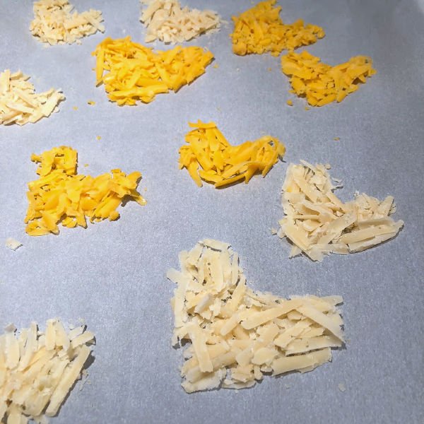 arrange cheese on parchment paper