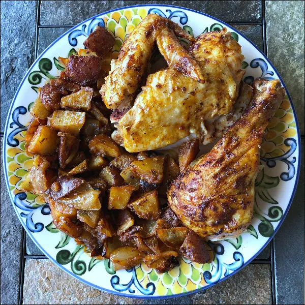 plate of paprika roasted chicken and potatoes